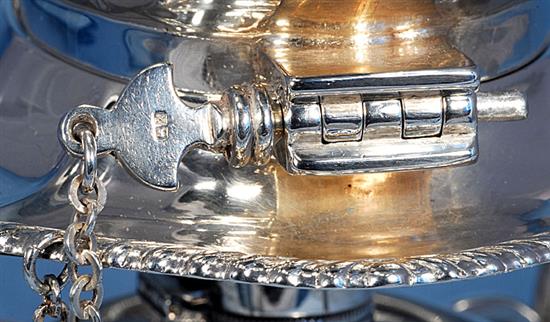 A silver kettle on stand, Height 11 ½”/290mm Width: 9”/230mm Weight 42.8oz/1213g.
